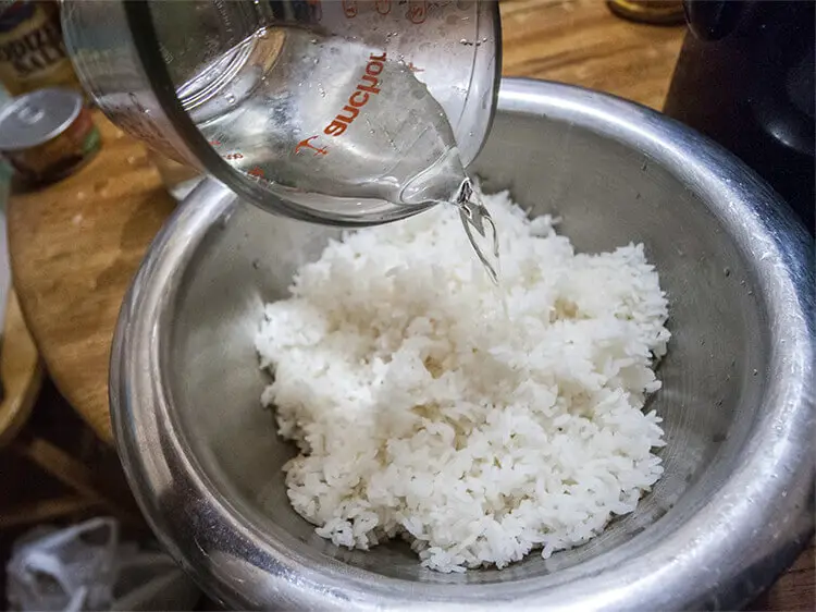 Season the rice and refrigerate it