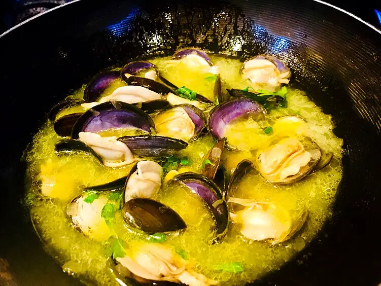 Enjoy your purple varnish clams dish