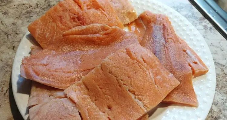 Use your senses to tell if thawed salmon is safe to eat